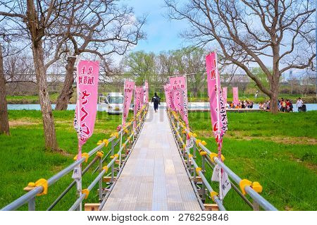 Iwate , Japan - April 22 2018: Unidentified People With Ferry Boat Crossing The Kitakami River To Ki