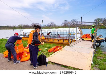 Iwate , Japan - April 22 2018: Unidentified People With Ferry Boat Crossing The Kitakami River To Ki