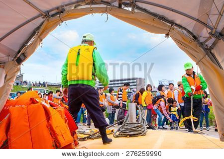 Iwate , Japan - April 22 2018: Unidentified People With Ferry Boat Crossing The Kitakami River To Ki