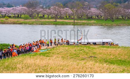 Iwate , Japan - April 22 2018: Unidentified People Wait For Ferry Boat Crossing The Kitakami River T