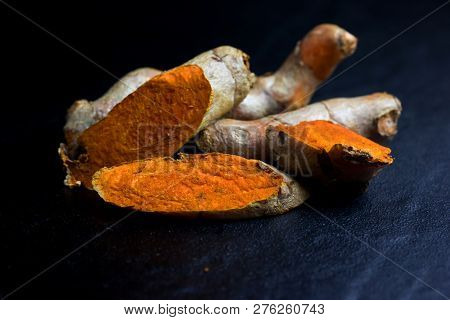 Fresh Turmeric Cut Haff Isolated On White Background