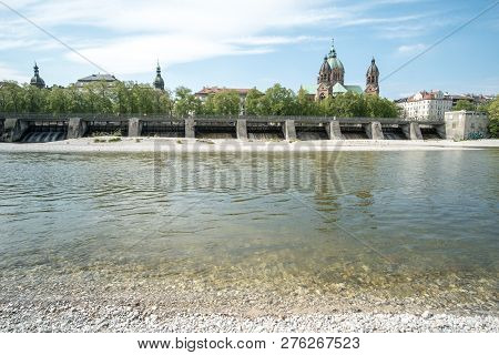 Munich, Germany - 21 April 2017 : View Of Building At The River Bank Of Isar River In Munich. With S