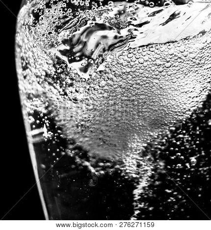 A Close Up Shot Of The Vortex Created By Shaking A Glass Of Water