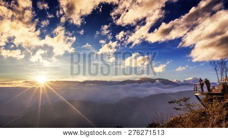 Taiwan, Cingjing - January 2013: A Pair Of Unidentified Men Stands And Enjoy The Beautiful Sunset Vi