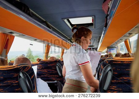 Marmaris, Turkey - May 26, 2018: Female Guide In The Bus With Tourists. People During Travel. Transf