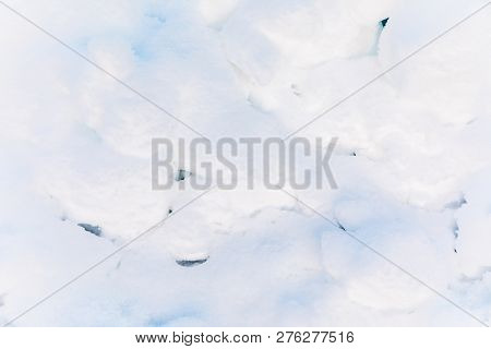 Snow And Ice Crystal Background Or Texture Of Russian Park Of Forest. The White Snow Surface Of The 