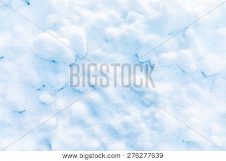 Snow And Ice Crystal Background Or Texture Of Russian Park Of Forest. The White Snow Surface Of The 