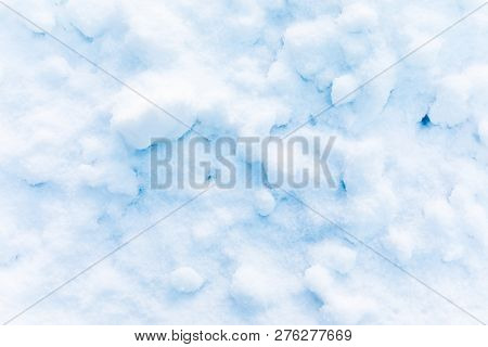 Snow And Ice Crystal Background Or Texture Of Russian Park Of Forest. The White Snow Surface Of The 