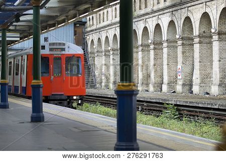 London - Uk / August 2012: Tube Station With The Train Arrival, Very Common Mean Of Transportation A