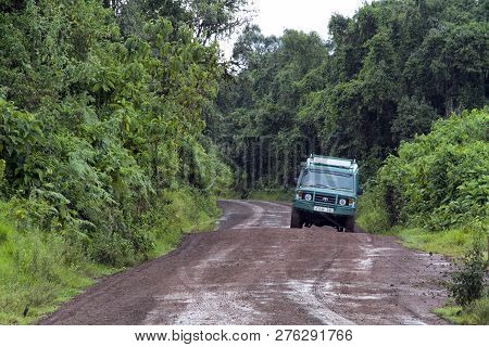 Ngorongoro Conservation Area- Tanzania/ Slippery Road After Heavy Rain With 4 Wheel Car Trying To Pa