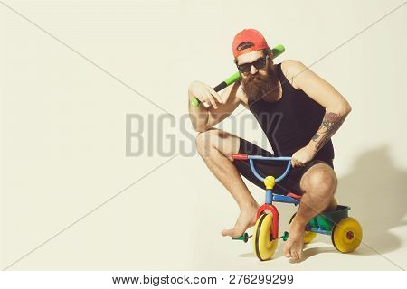Bearded Man, Long Beard, Brutal Caucasian Hipster With Moustache In Black Vest, Sunglasses, Red Cap 