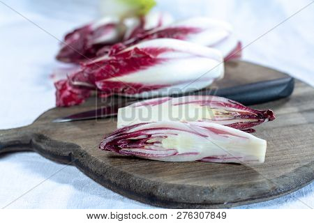 Group Of Fresh Red Radicchio Chicory Or Belgian Endive Vegetables, Also Known As Witlof Salade
