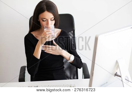 Heart Pain. Woman Having Panic Attack At Workplace