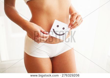 Women Health. Beautiful Female Body In Panties With Smile Card