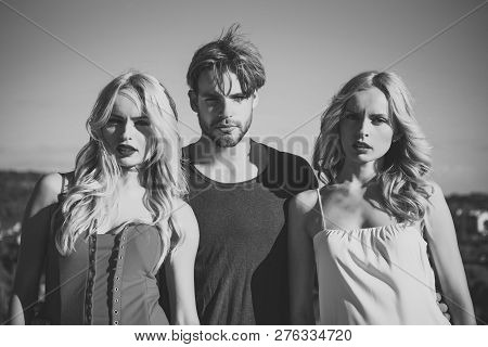Twins Women With Macho On Blue Sky Background. Man With Beard With Twins, Relations. Family Trust, P