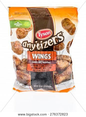 Winneconne, Wi - 30 December 2018: A Bag Of Tyson Anytizers Chicken Wings Honey Bbq Flavor On An Iso