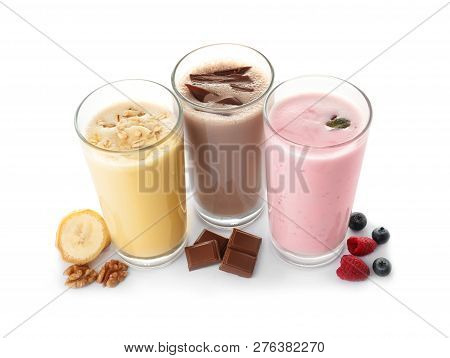 Glasses With Different Protein Shakes And Ingredients Isolated On White