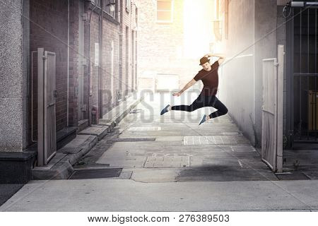 Dance is his world . Mixed media