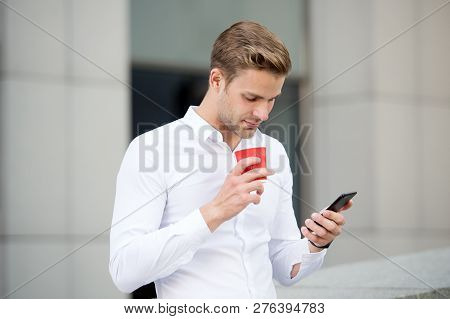 Send Message. Man Drinks Coffee Read Message Urban Background. Start Great Day. Businessman Relaxing
