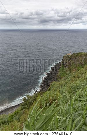 The Faro Do Arnel Lighthouse Near The Town Of Nordeste On Sao Miguel In The Azores.