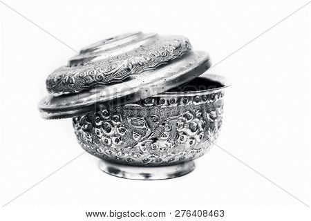Close Up Of White Or Silver Colored Shiny Container Isolated On White.
