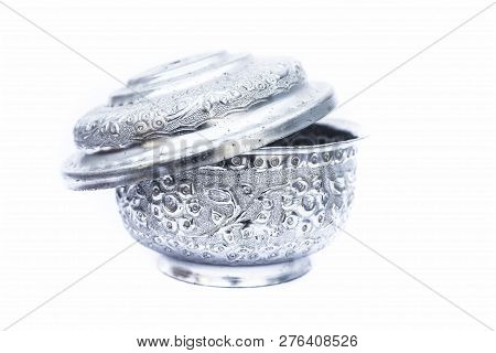 Close Up Of White Or Silver Colored Shiny Container Isolated On White.