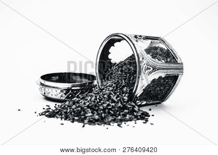 Close Up Of White Or Sliver Colored Shiny Container Used To Store Mukhwas  Or Mouth Freshing Snack I