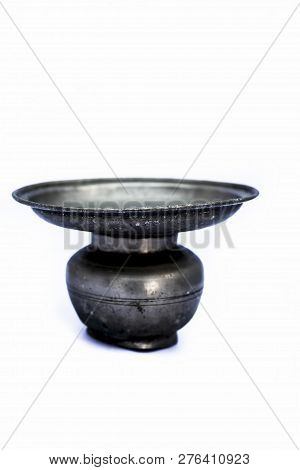 Close Up Of Old Ancient Vessel Or Utensil Or Container Or Isolated On White I.e. Chilamchi Or Chelam