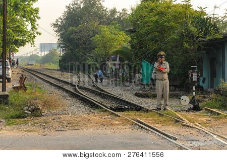 Samutsakorn,thailand-11 February: Unidentified Thai An Elderly Man Who Is A Railway Traffic Controll