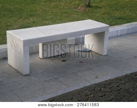 White Marbel Bench And A Flip Flop