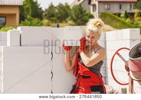 Woman Working With Airbricks