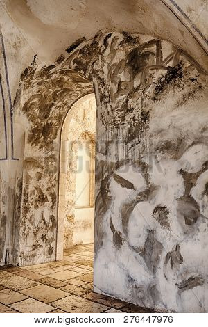 An Arch Leads Towards The Light Of The Outdoor Mall At Mamilla Near The Old City Of Jerusalem.
