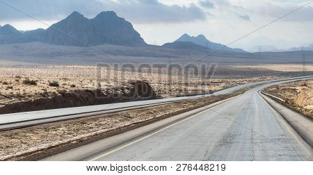 Maan, Jordan, December 07, 2018 : Intercity Route Passing Near The Foot Of The Red Mountains In The 