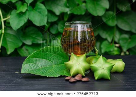 Sacha Inchi, Fresh Capsule Seeds Fruit Of Sacha-inchi Peanut With  Tea