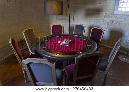 Mello, France - August 28, 2018: Poker Table In The Room In The Old Castle.