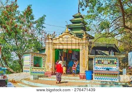 Sagaing, Myanmar - February 21, 2018: The Entrance Gate Of U Min Thonze Temple With Old Anrrow Galle