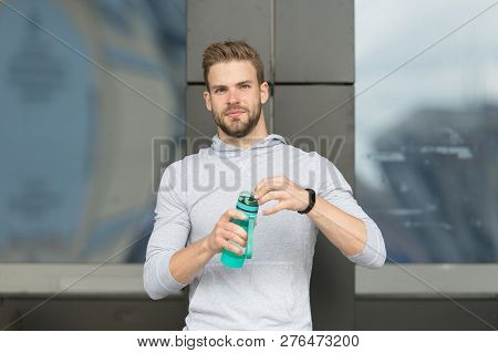 Thirsty Concept. Young Guy Look Thirsty. Thirsty Man Hold Water Bottle. A Drop Of Water Is Life For 