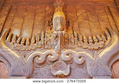 The Close-up Of The Wooden Decoration Outside Of The Medieval Bagaya Monastery, Its Door Surrounded 
