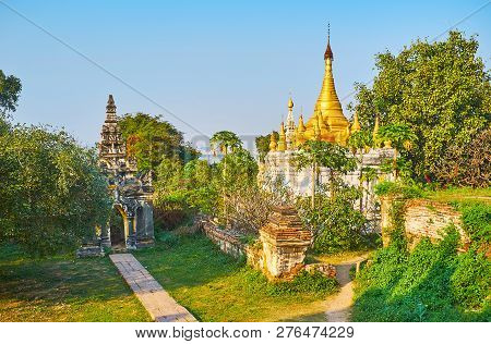 The Carved Gilded Stupas Of Htilaing Shin Pagoda Is Neighboring With Old Gate Of Maha Aungmye Bonzan