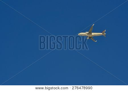 Dubai, Uae - Jun 5, 2018: Passenger Airplane Flying In The Blue Sky.