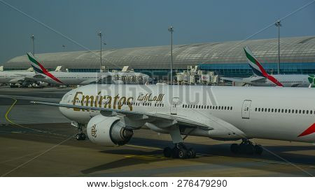 Passenger Airplane Docking At The Airport