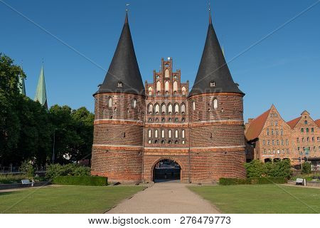 Luebeck, Germany - June 7, 2018: Historic Holsten Gate, Landmark Of The Hanseatic City Of Luebeck On