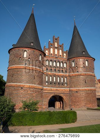 Luebeck, Germany - June 7, 2018: Historic Holsten Gate, Landmark Of The Hanseatic City Of Luebeck On