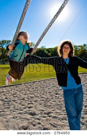 Pretty Girl Enjoys Swinging With Her Mother