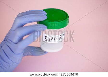 Health. Sperm Analysis. Concept Of Bank Sperm. Infertility. Doctors Hand Holding Container For Analy