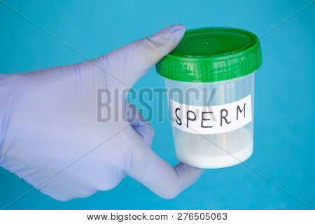 Health. Sperm Analysis. Concept Of Bank Sperm. Infertility. Doctors Hand Holding Container For Analy