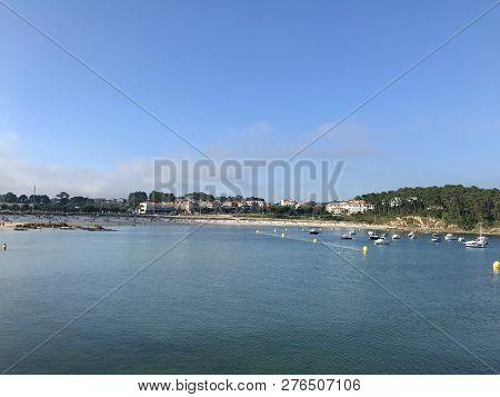 View From The Pier With Boats At The Distance In Sanxenxo Galicia Spain