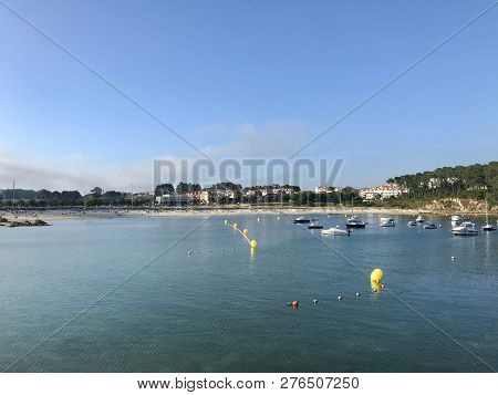 View From The Pier With Boats At The Distance In Sanxenxo Galicia Spain