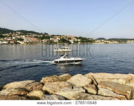 View From The Pier With Boats At The Distance In Sanxenxo Galicia Spain