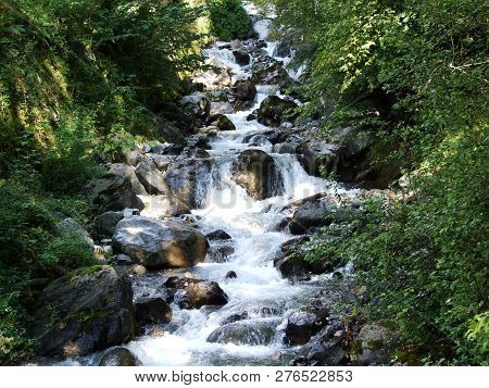 Cascade At The Bracherbach Stream In The Braunwald Forest - Canton Of Glarus, Switzerland